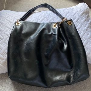 Black Vera Wang purse with gold tone hardware